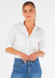 Model posing in the betty basics heston shirt vanilla white.