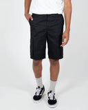 A person standing against a white background, wearing black Dickies cargo shorts and white sneakers.