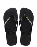 Havaianas Kids Brazil Logo Jandals in Black 1069 front view showing the comfortable open toe thong straps with the raised rubber Brazil flag and contrast logo design, sold by Point Break Cambridge local family surf shop at 63 Duke street.