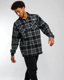 Action Shot of the Majestic Split Check NY Yankees shirt jacket in faded black plaid with button closure.
