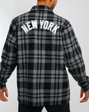 Back view of the men's Majestic Yankees plaid shacket displaying the relaxed fit and curved shirt-tail hem.
