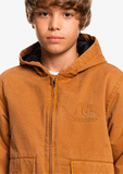 Close-up detail of the warm fleece interior lining and durable water-repellent shell on the youth Quiksilver jacket.