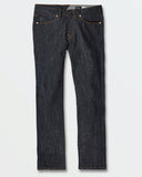 Front view of the Volcom Vorta Denim Slim Fit Jeans in Rinse wash showing the dark indigo tailored leg cut and classic zip fly setup.