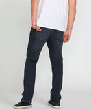 Back view of the Volcom Vorta Denim Slim Fit Jeans style A1912302 in Vintage Blue showing the asymmetric yoke line.