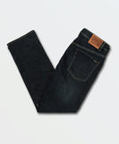 Close up detail of the premium Vintage Blue denim wash, metal rivets, durable stitching, and Volcom branded hardware.