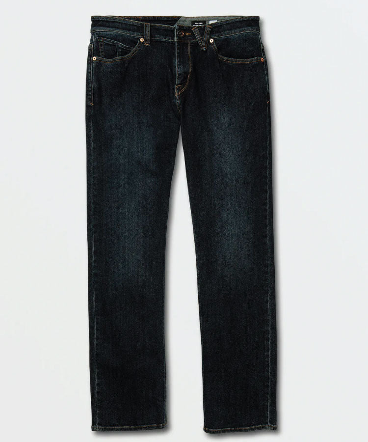 Front view of the Volcom Solver Modern Fit Denim Jeans in Vintage Blue wash showing the straight leg cut and five-pocket setup.