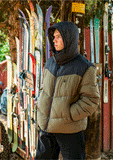 Front view of a man wearing the Volcom Goldsmooth jacket in Military green showing the flattering side angle.